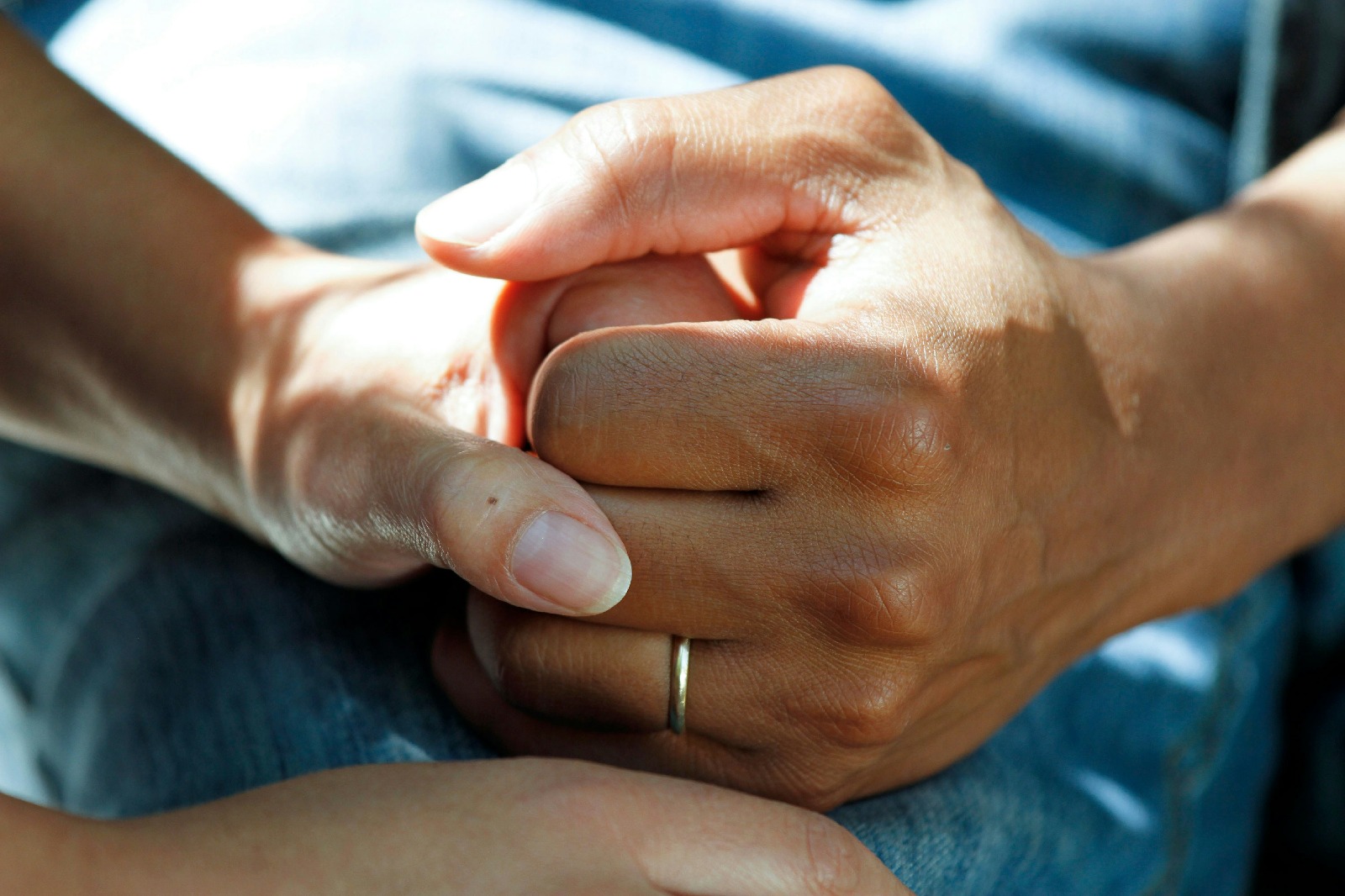 Reassuring hands representing dependable ongoing support